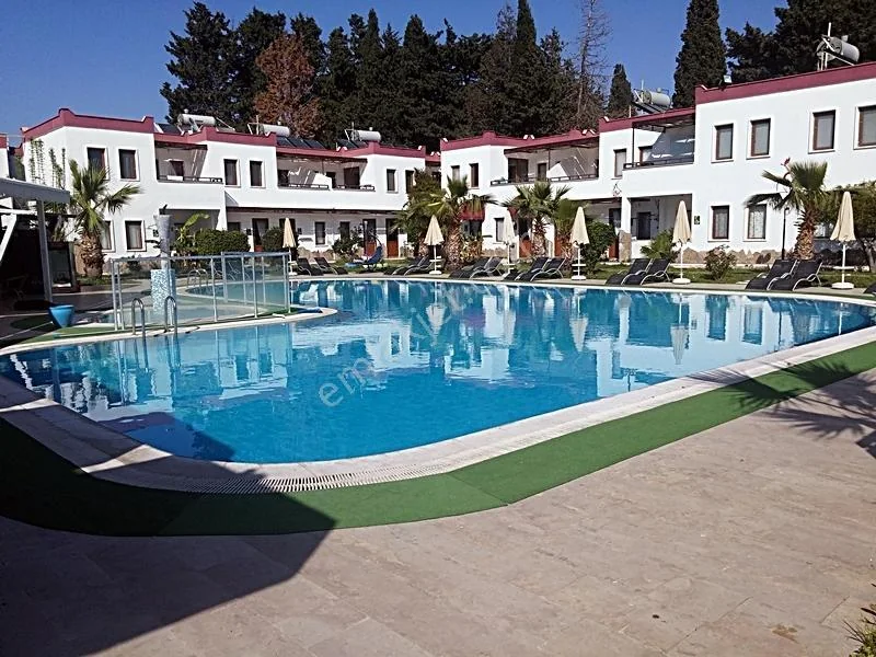 *Wohnung zum Verkauf in Turgutreis Yalı, gegenüber dem Yachthafen, in einem Komplex mit Pool*, photo 1